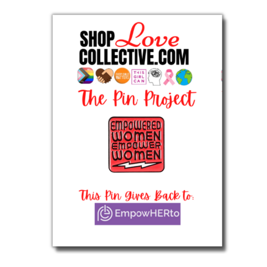 An enamel pin in the shape of a red square with black text reading "EMPOWERED WOMEN EMPOWER WOMEN" (with a white lightning bold underneath), is mounted on a cardstock reading "Shop Love Collective .com, The Pin Project." Directly below that are several symbols including the Progress Pride Flag, white & brown hands holding in the shape of a heart, the words "every child matters" in an orange circle, and more. At the bottom of the cardstock it says "This pin gives back to EmpowerHERto"